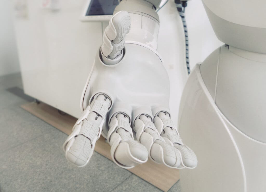 a robot hand representing artificial intelligence
