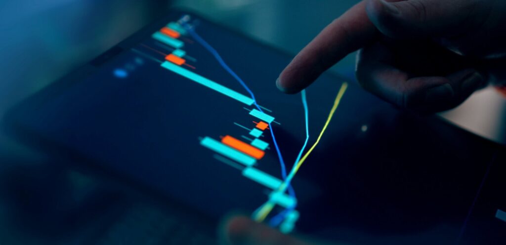 Person analyzing a digital performance chart, representing data-driven measurement of ROI from Generative AI